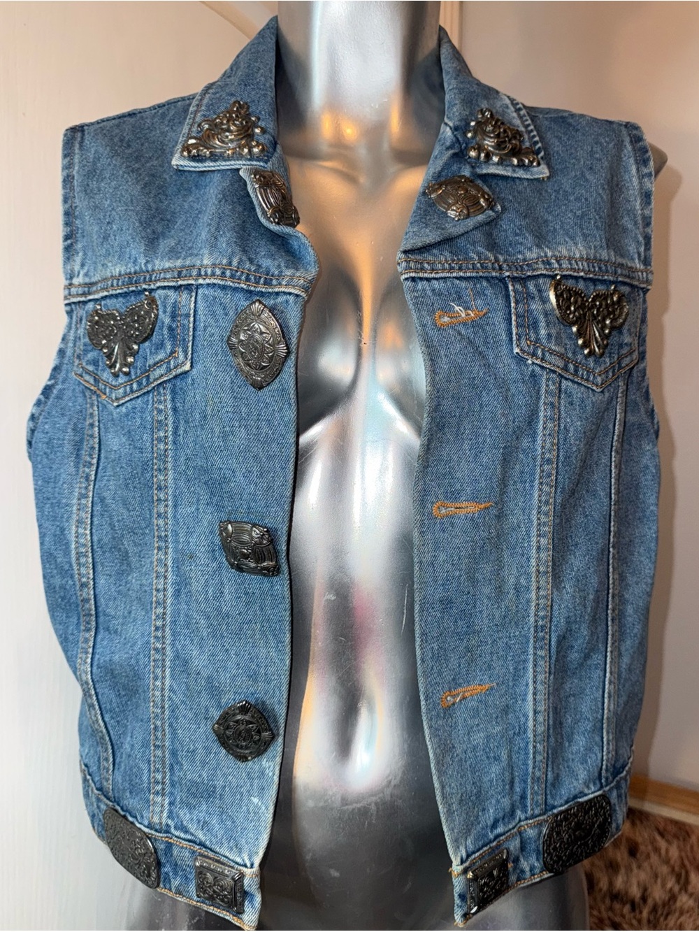 Women’s Blue Denim Vest with Decorative Metal Accents
